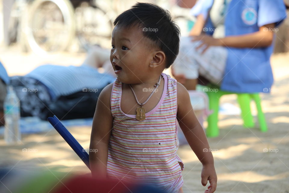 What? .. Child at Jomtien Beach Pattaya Thailand 