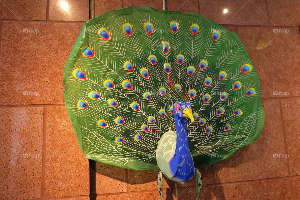 Festive decoration, green peacock
