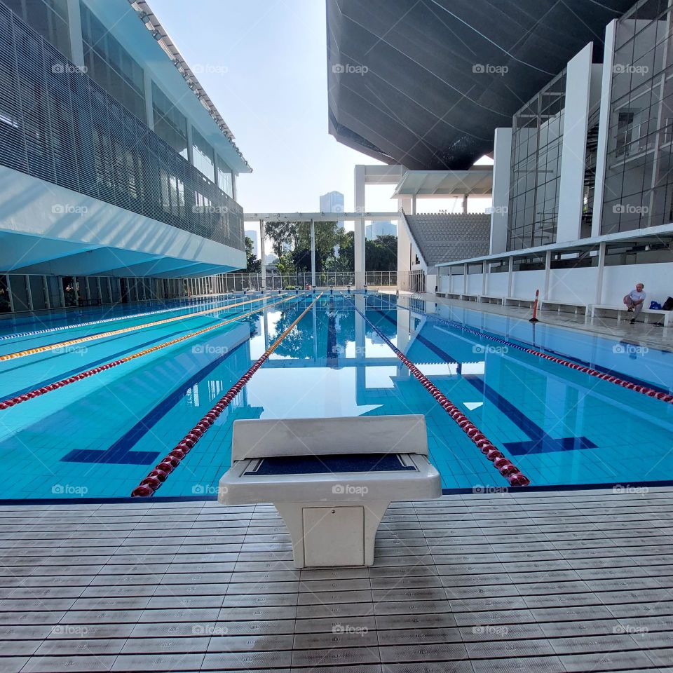 the pool area has been prepared for the swimming competition.  The swimming track has been installed in the pool and the championship is ready to start
