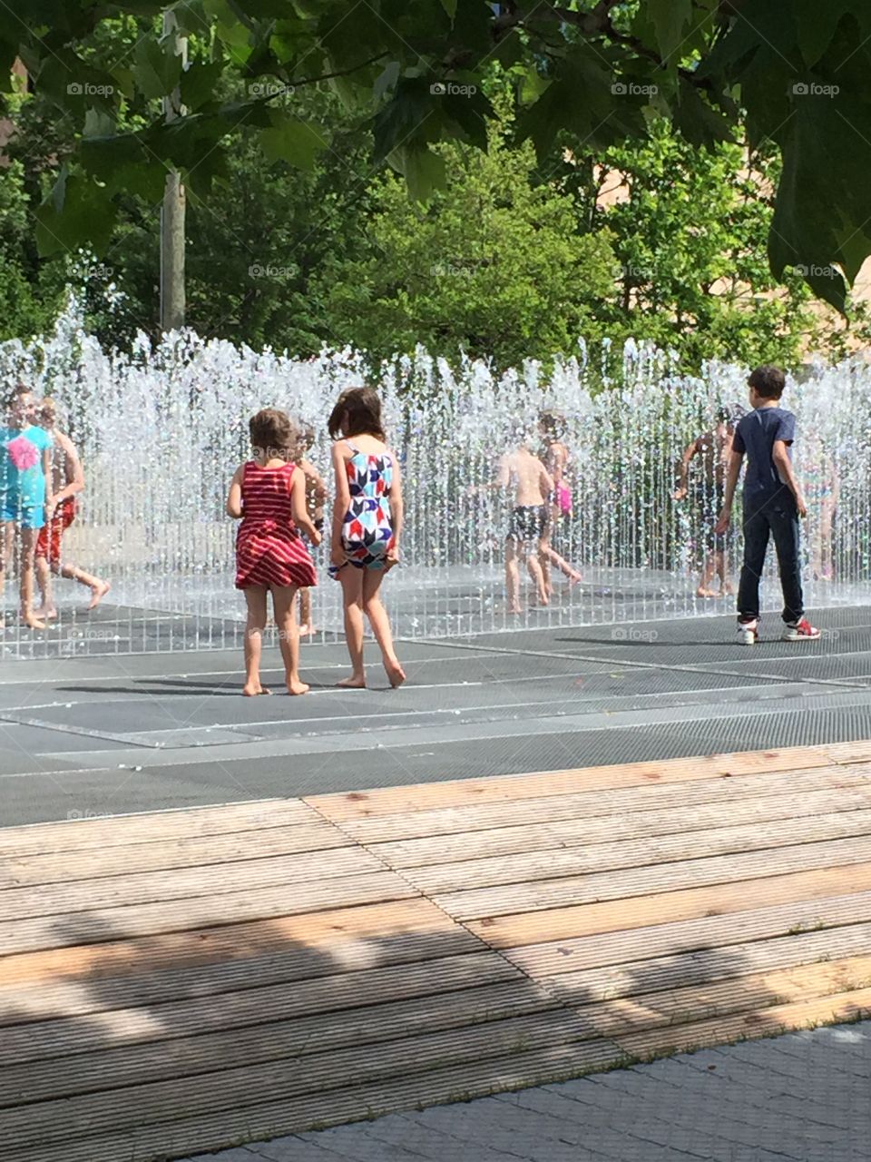 Kids in fountain 