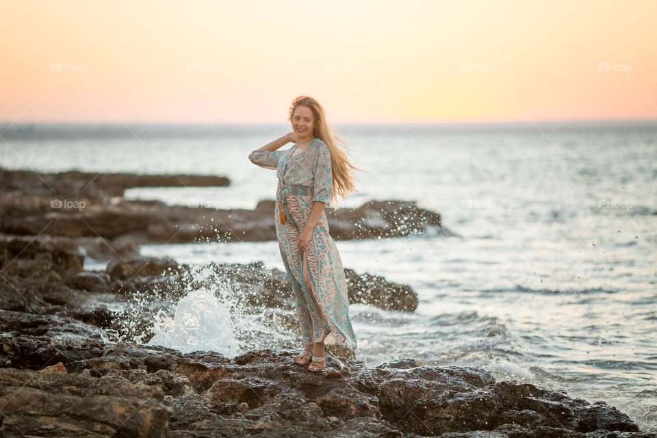 Portrait of beautiful young woman at outdoor