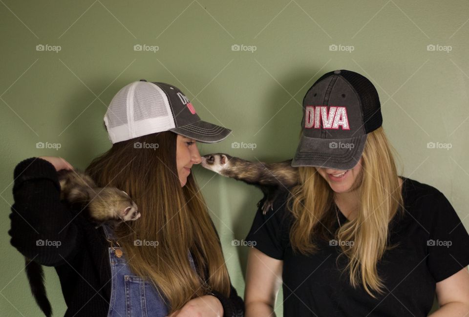 Ferret Kisses; My sister and I playing with ferrets, Maggie and Doc. 