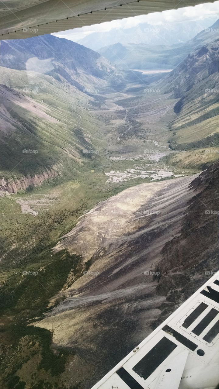 Flying over the high mountains in a float plane. #Floatplane