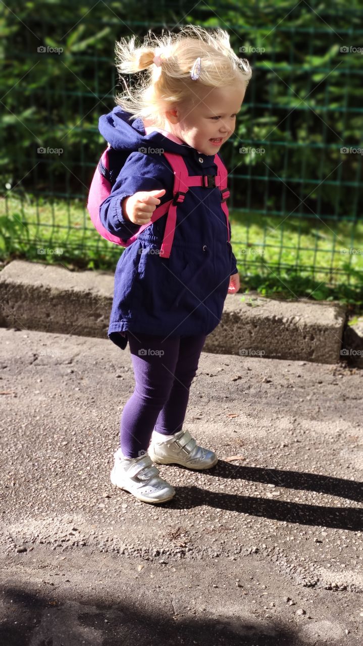 happy little Girl on the wind