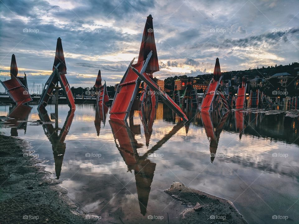 Beach after the huge rain at the adriatic seaside in Slovenia at summertime. Travel conception.