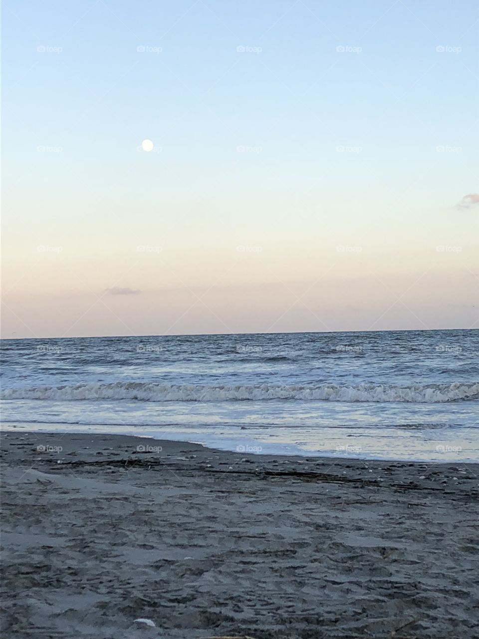 A rare sighting - full moon at sunset on the beach. Awestruck and happy. Folly Beach, South Carolina