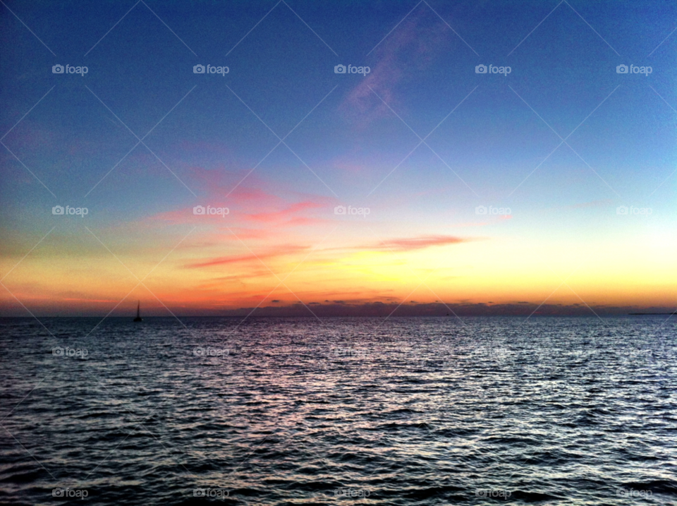 sunset key west twilight on a boat by ajkashyap