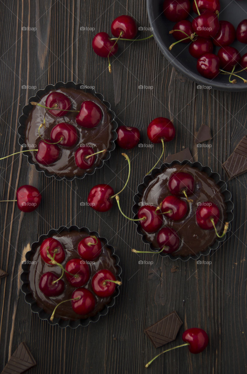 High angle view of chocolate cake with cherry