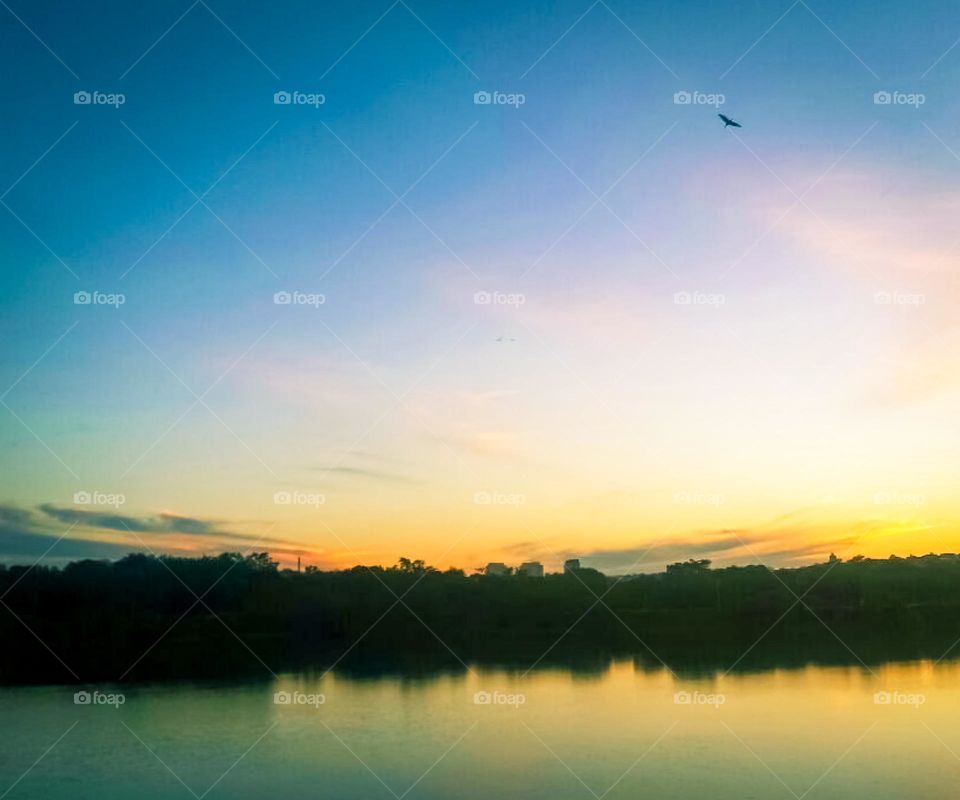 Try it. I don't know, there's always a sunset waiting to be seen, a tree, a bird, a river, a cloud. At least smile, try to feel love. Imagine. Invent. Dream. Fly.(Caio Fernando Abreu)