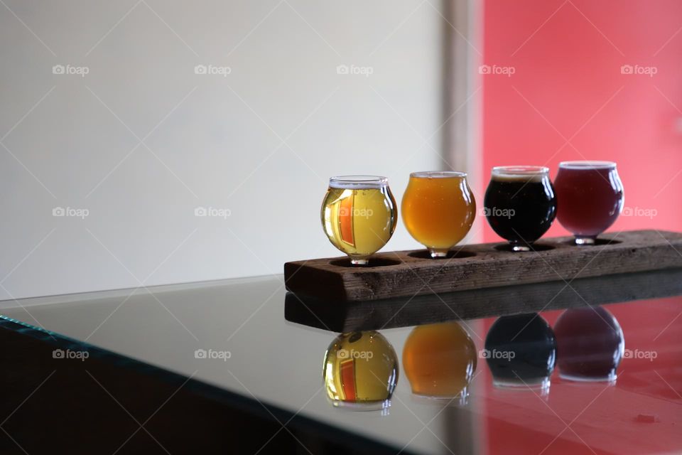 Beer flights on a glass table 