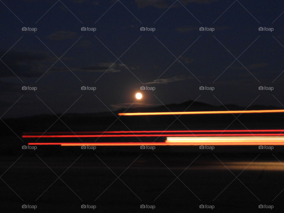 Moon rise by the highway