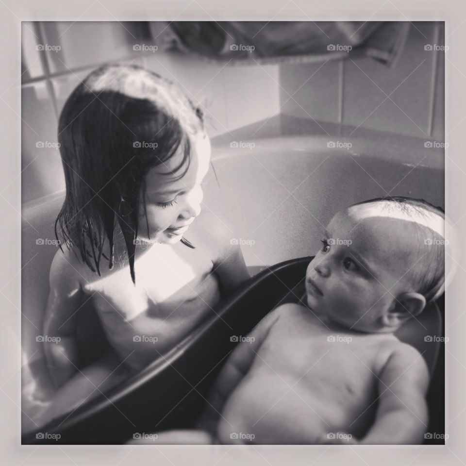 Baby Sister and Brother in the Tub