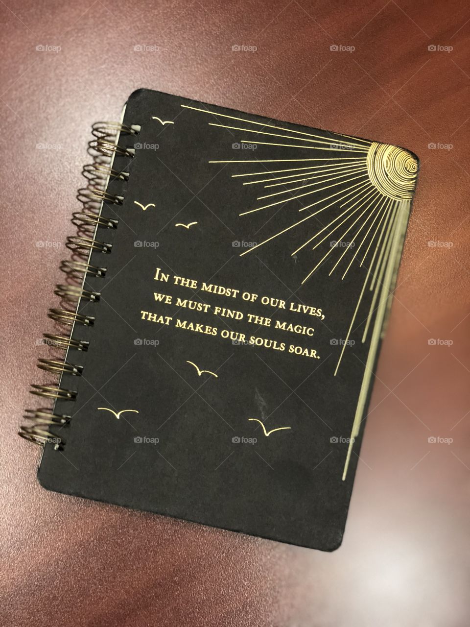 Inspirational notebook on a table 