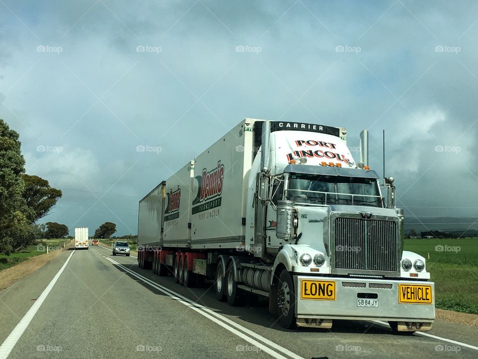 Road train large truck on Australian highway 