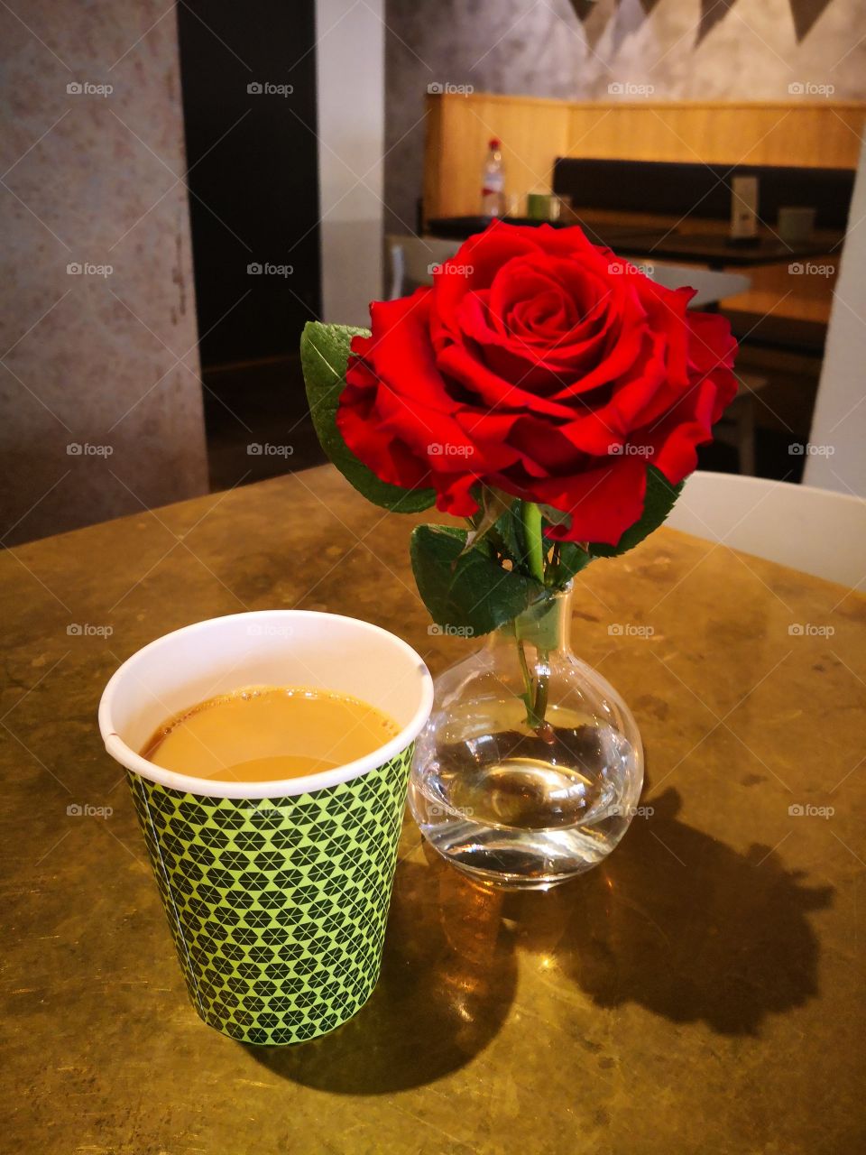 Coffee with a rose.