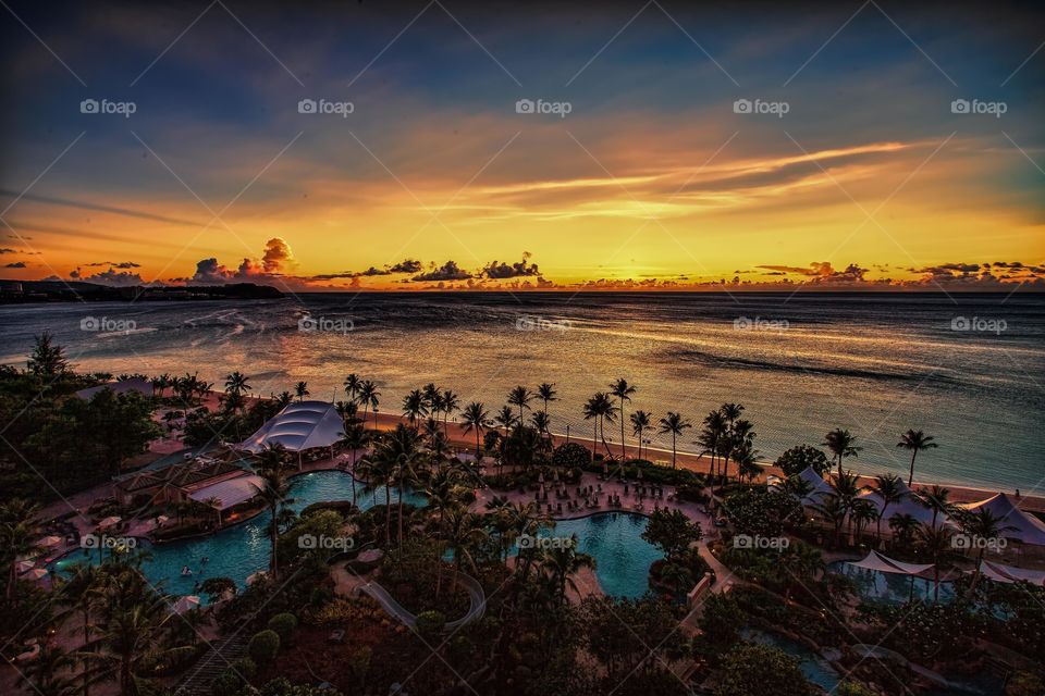Sunset over a tropical beach resort