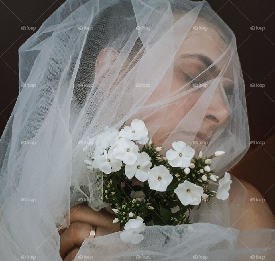 An unusual portrait of a girl with flowers