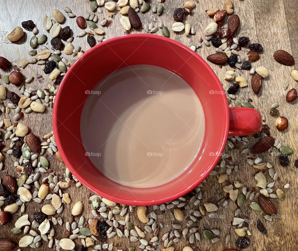 I love my coffee with a little cream, and in my favorite big red mug, together with a little snack of mixed trail mix, gets me through the day
