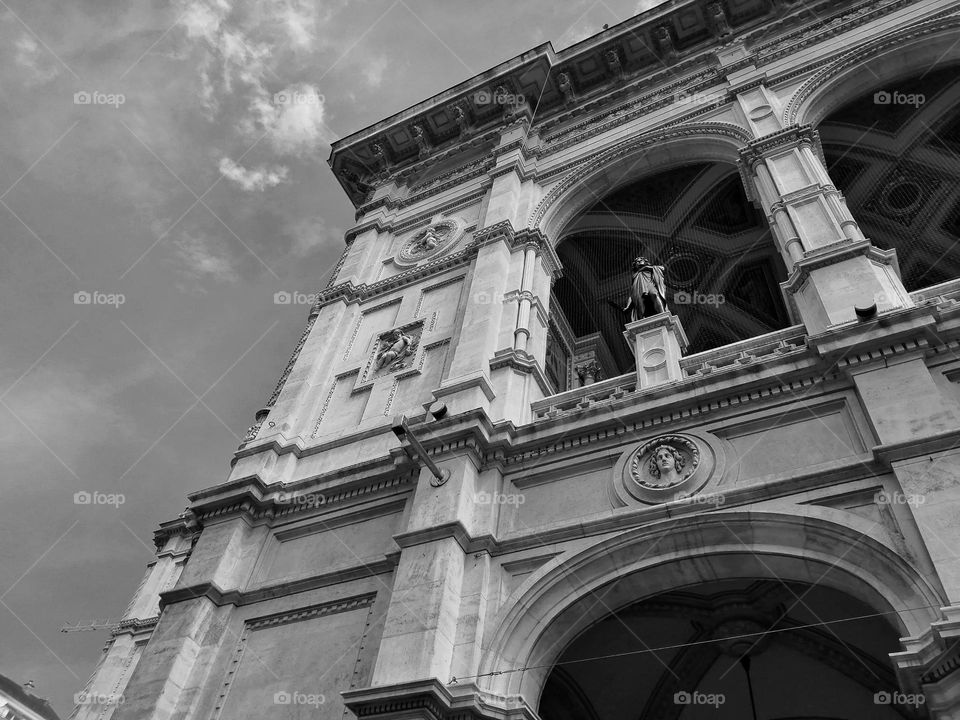 A beautiful photo in black and white of an old building with stunning architecture captured with a phone camera