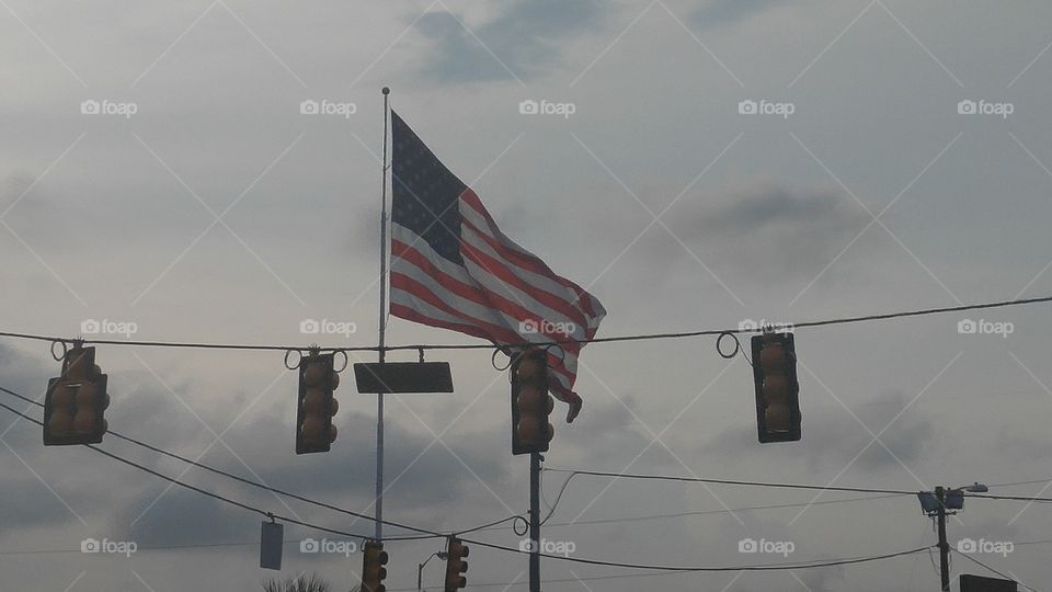 american flag flying high