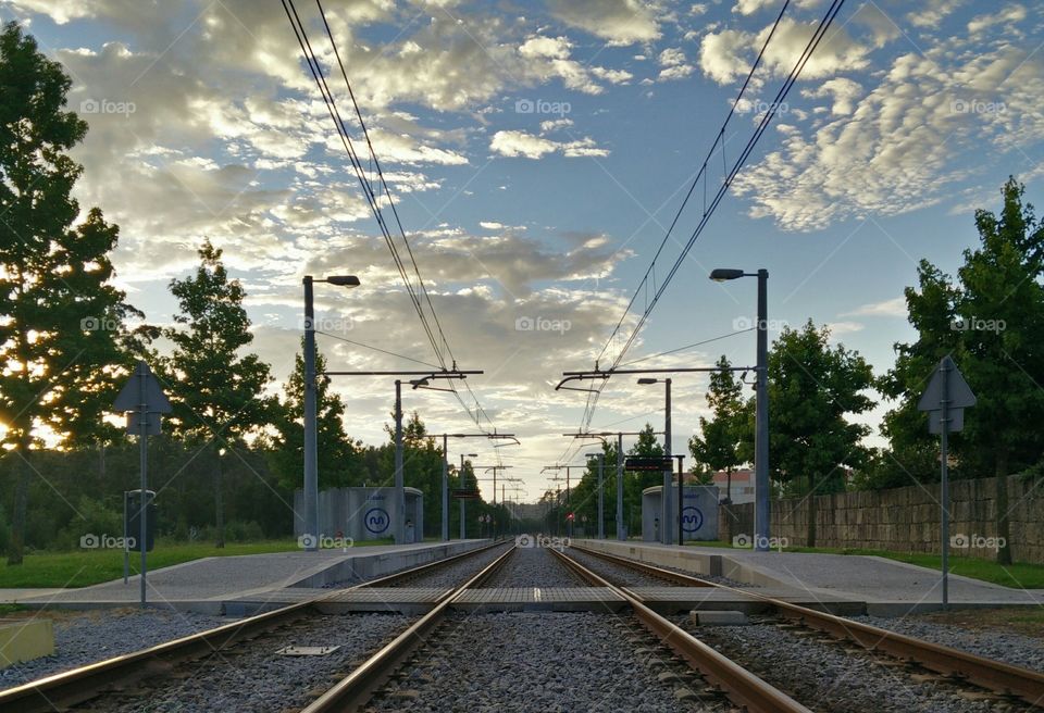 Twilight railroad. Walking home from a film shoot and noticed the clouds on the sky. Decided it would make for a great picture.