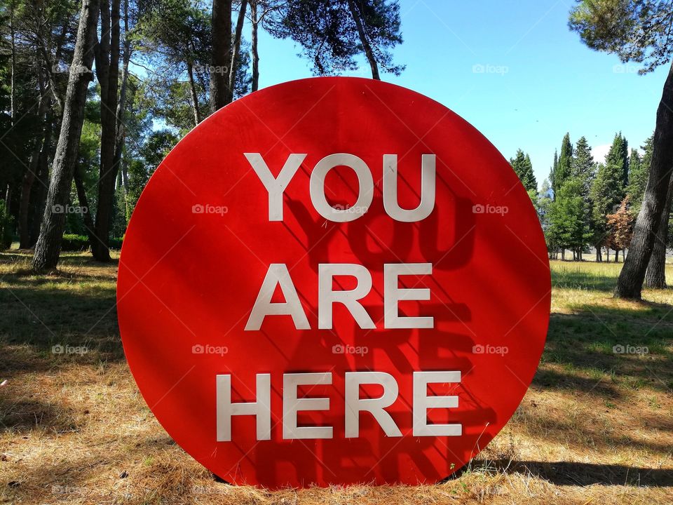 Red symbol with inscription: you are here