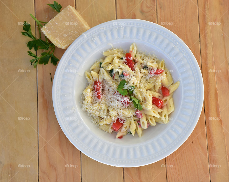 Pasta with cheese in plate