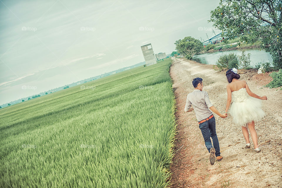 running in paddy field