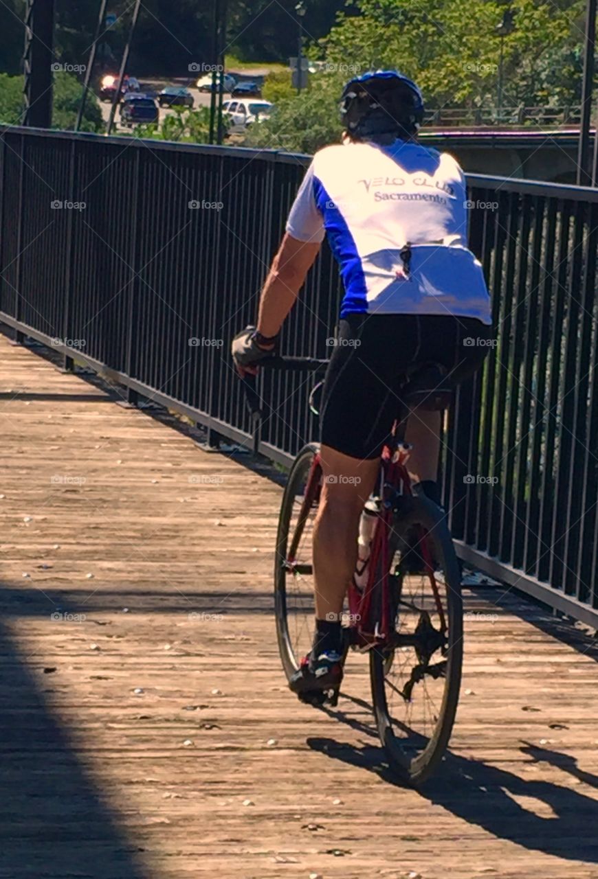 Biking on bridge