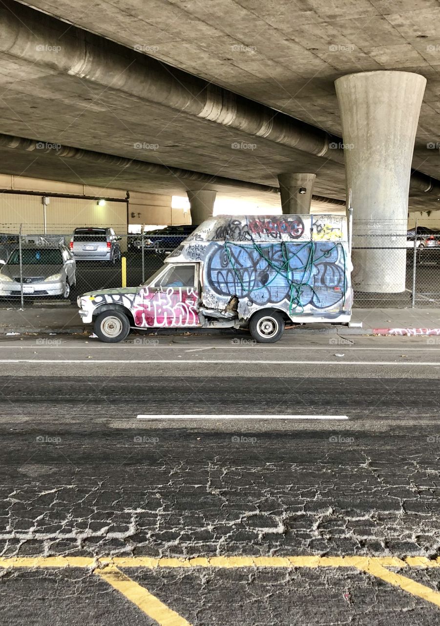 This broken down, graffiti mobile has been in this spot for so long, it’s now a neighborhood staple. Located on west grand ave and San Pablo Ave in west Oakland.