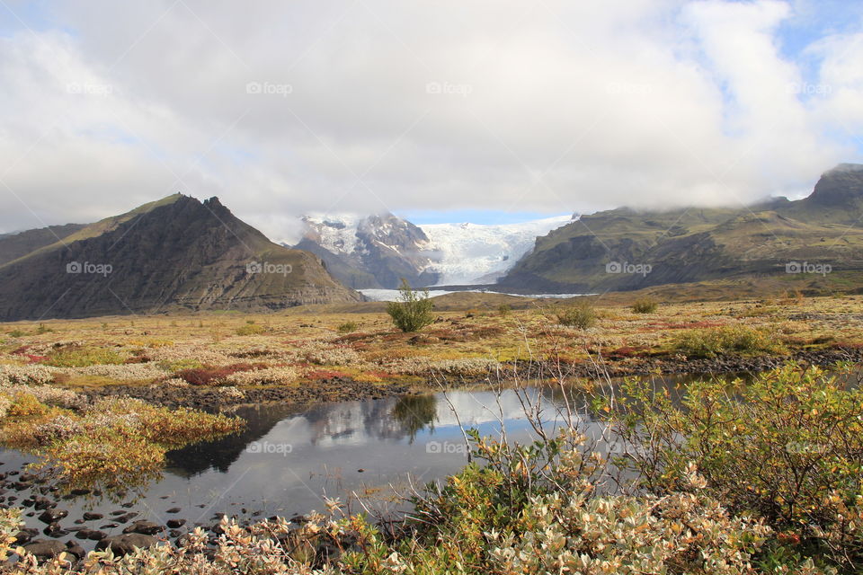 Glacier reflected in a pond