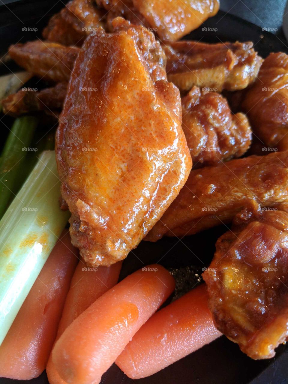 Tasty, Delicious Buffalo Chicken Wings, Carrots, and Celery at Duff's Famous Wings near Buffalo, New York