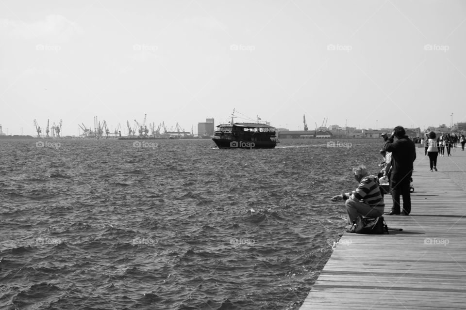 Sunday fishing. Photo taken in harbor of Thessaloniki