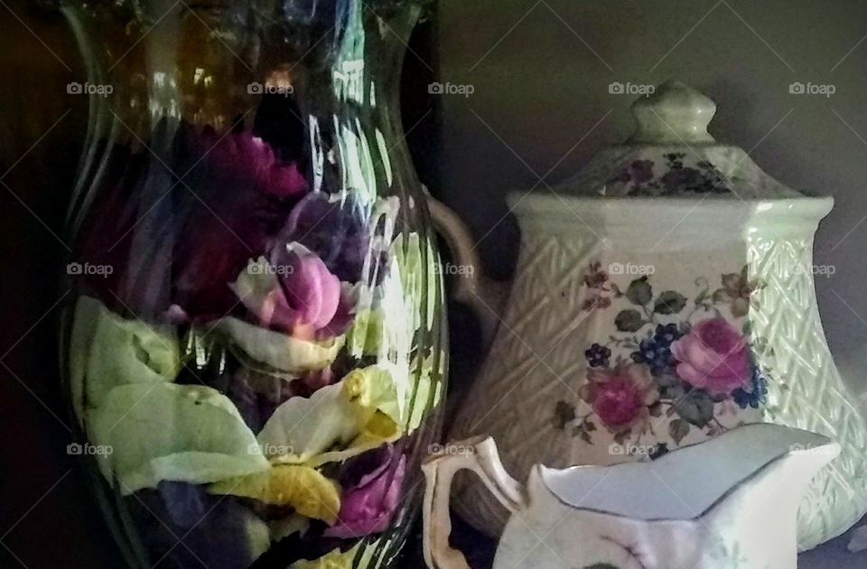 China set and rose petals