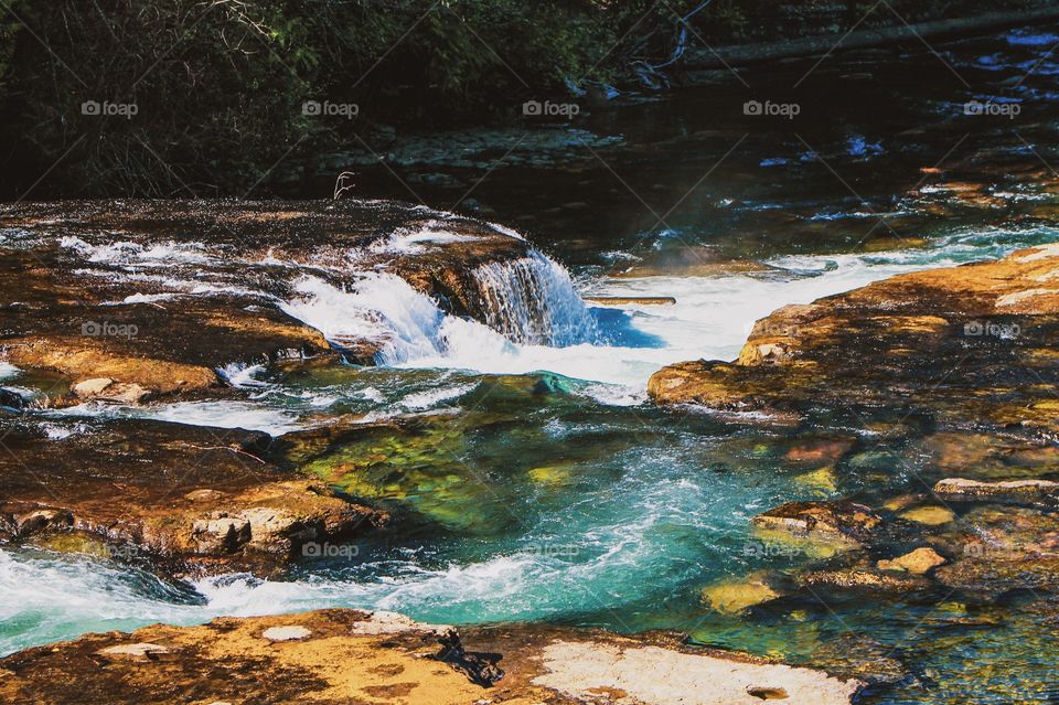 Aqua green glacial water,tumbling over river worn rocks full of smooth potholes, & cascading over small waterfalls into deep pools. A perfect place to swim on really hot summer days but getting into the cold water can be quite shocking! 🥶