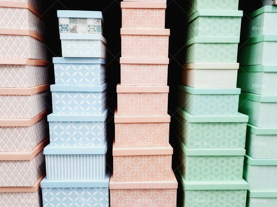 stack of colorful boxes of various sizes