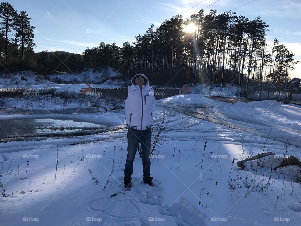 Man standing on snowy landscape