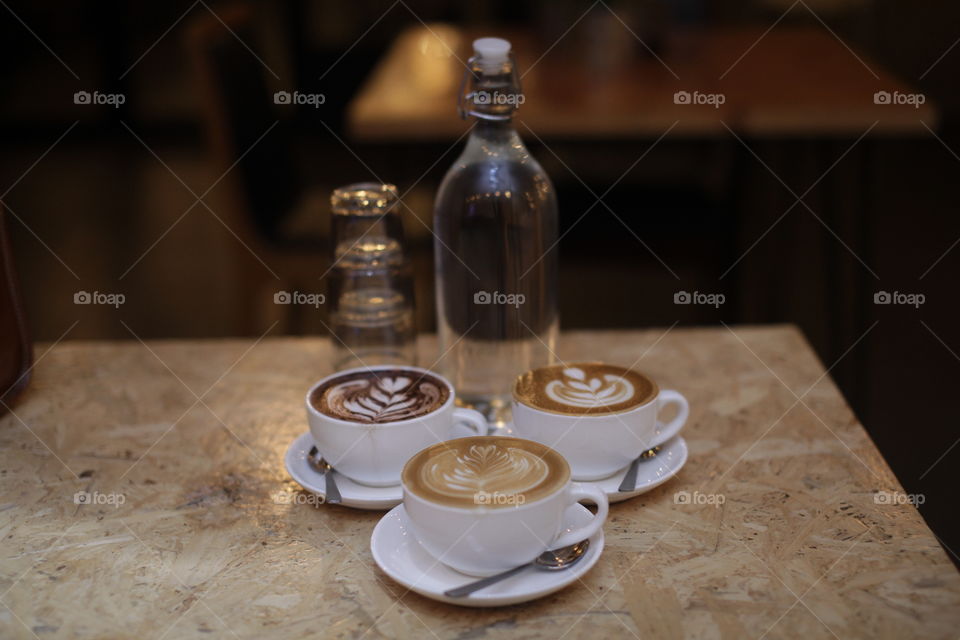 Chocolate late, mocha latte & coffe latte on the table 