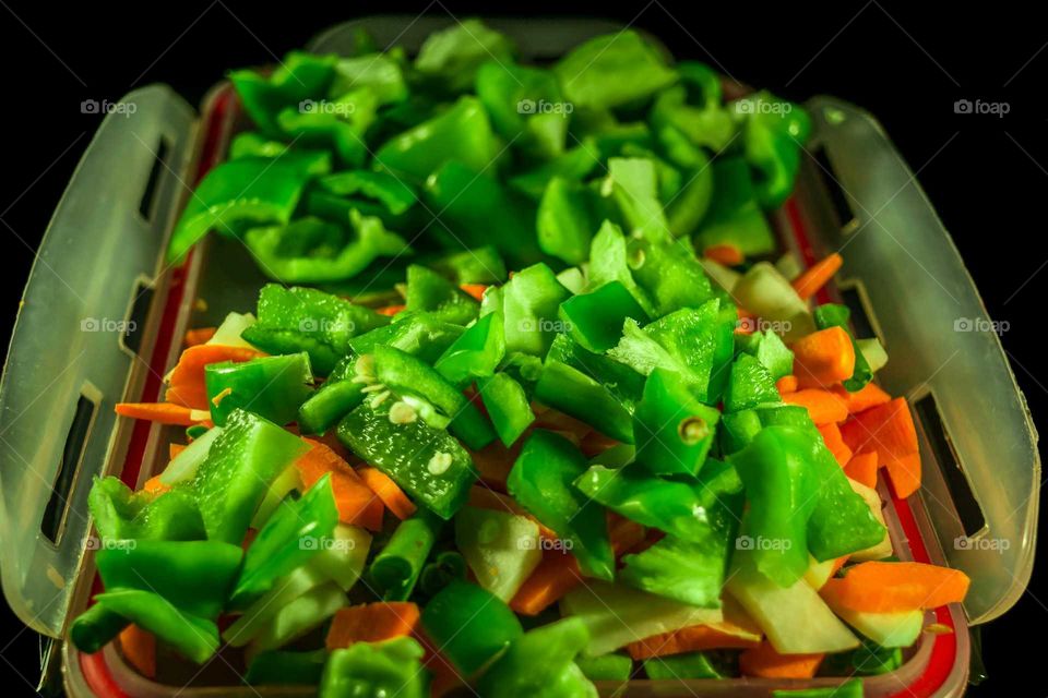 green and healthy vegitables. green fresh capsicum abd carrot and radish