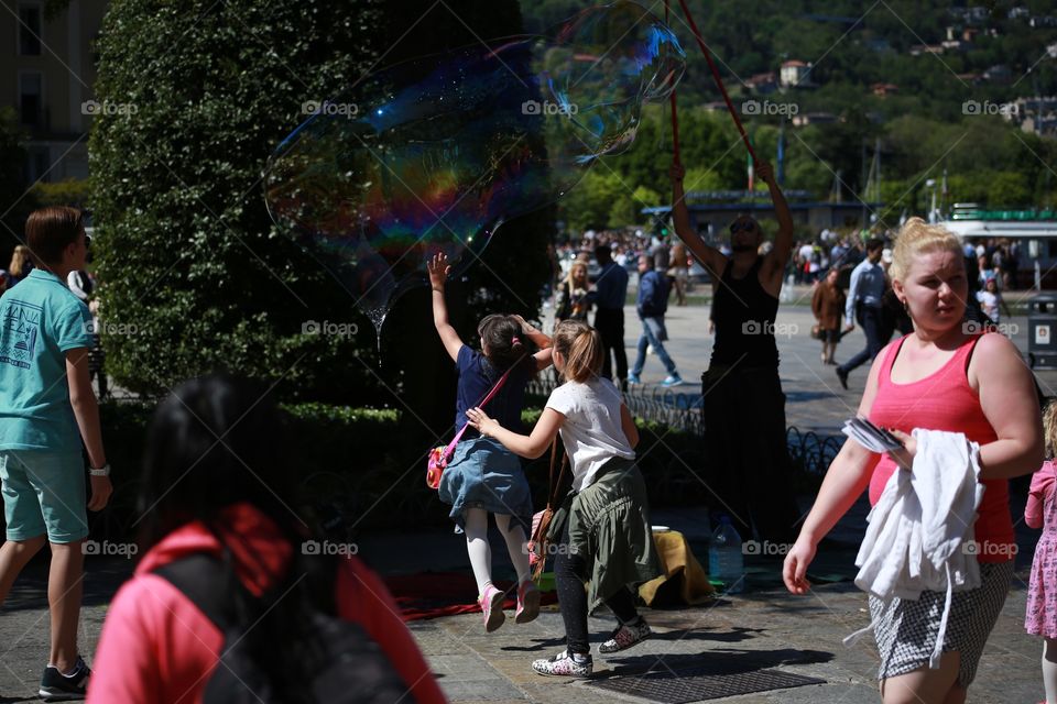 Children playing bubbles 