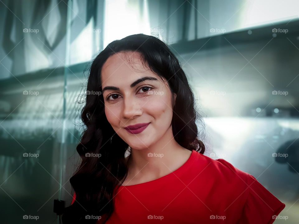 Beautiful Afghani woman in red