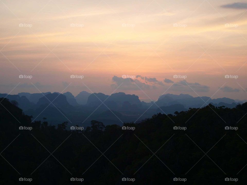 silhouette of mountains during sunset