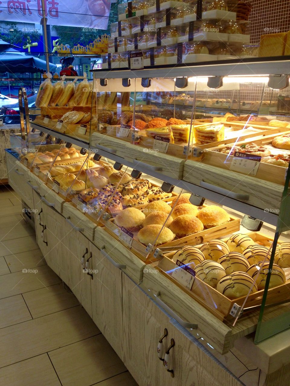 Freshly backed pastry and baking in the window in coffeeshop 