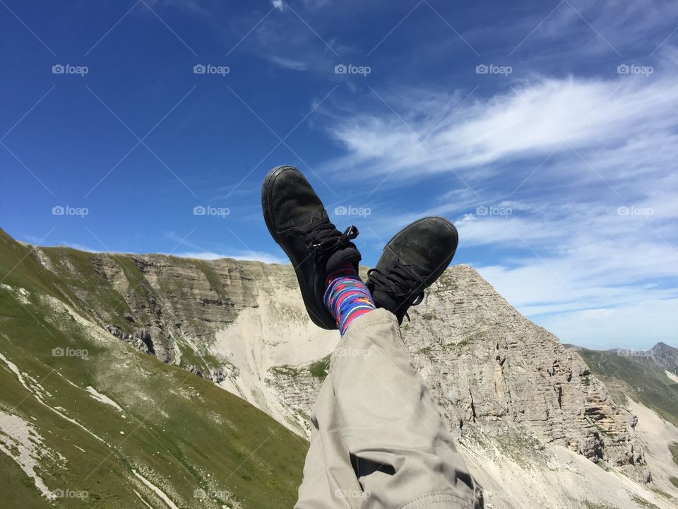 Feet above in high mountain