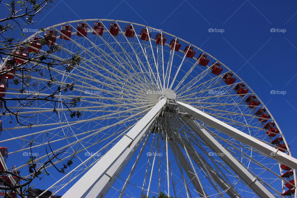 Ferris Wheel at Navy Pier. The famous ferris wheel at Navy Pier backed by a crisp blue sky.