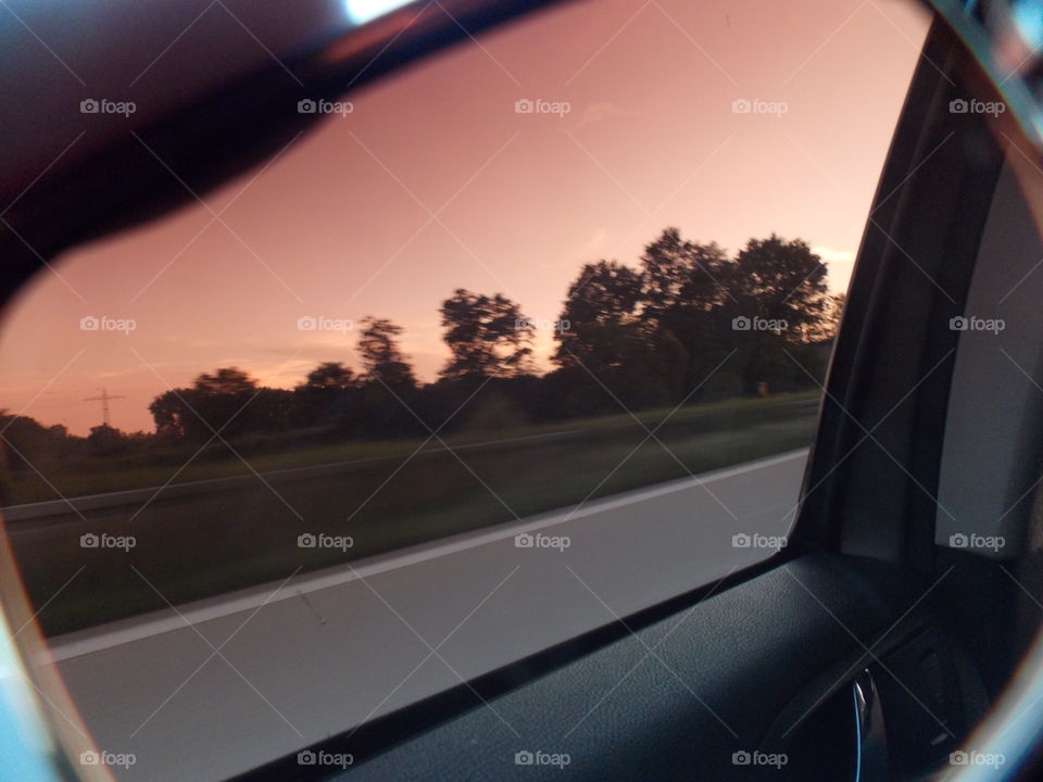 capturing through sunglasses, playing in a car