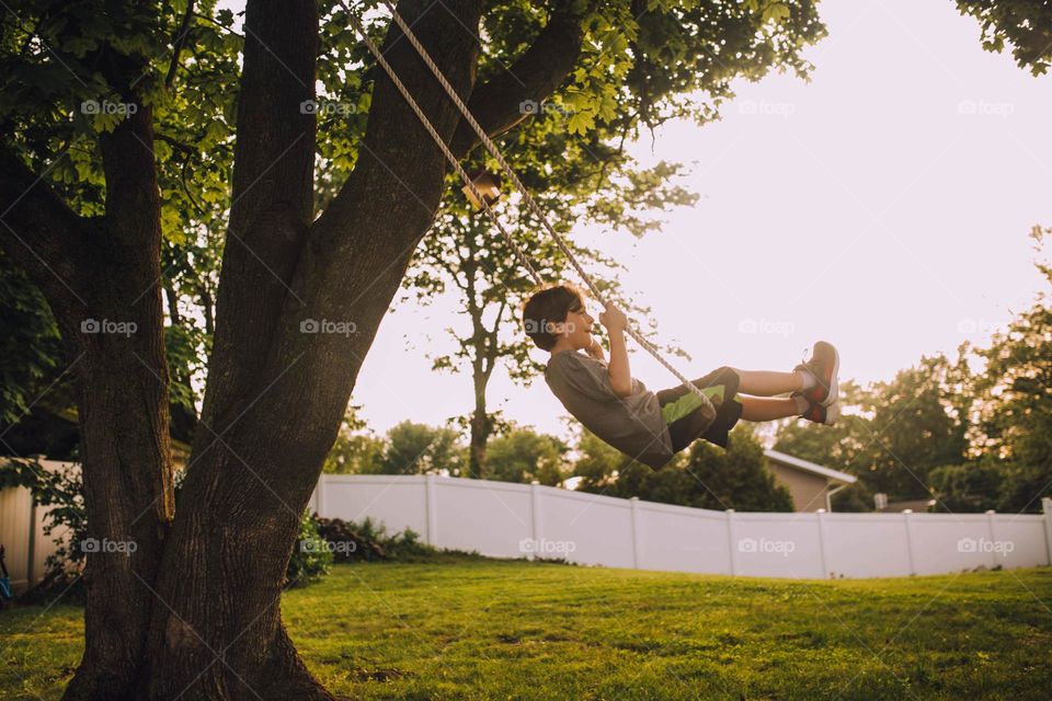 Boy on a swing