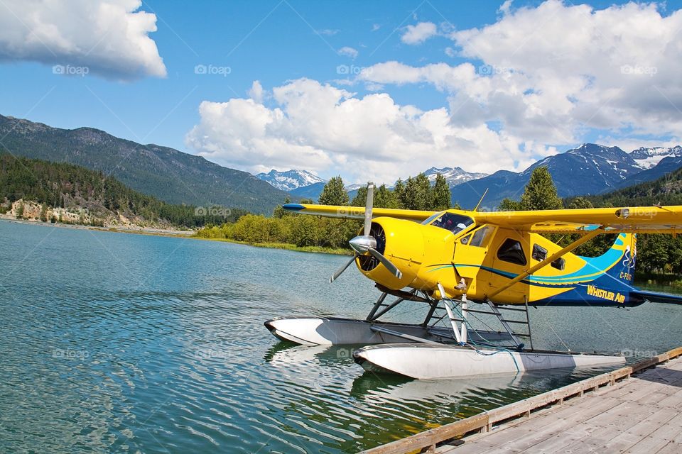 A nice seaplane with a nice background.