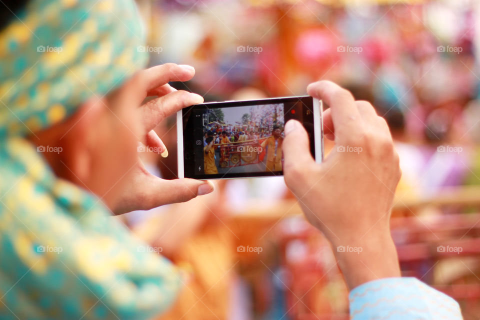 Photographer in festival.