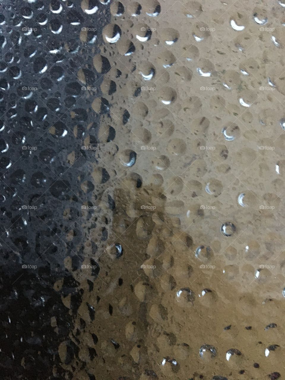 Raining on the garden glass table